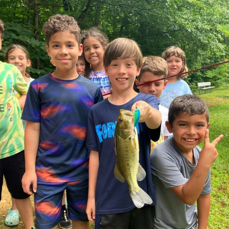 Boy holding fish
