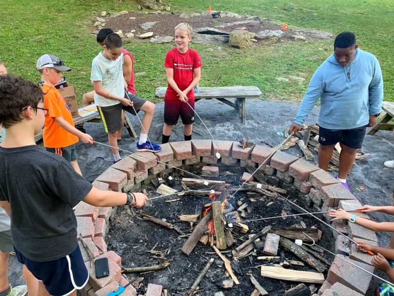 Campers roasting marshmallows