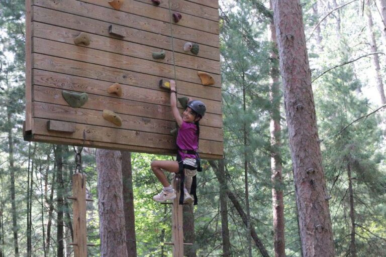 Girl on climbing wall