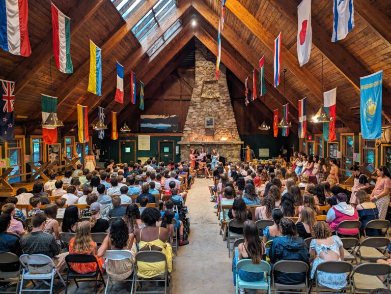 Wide angle of mess hall gathering