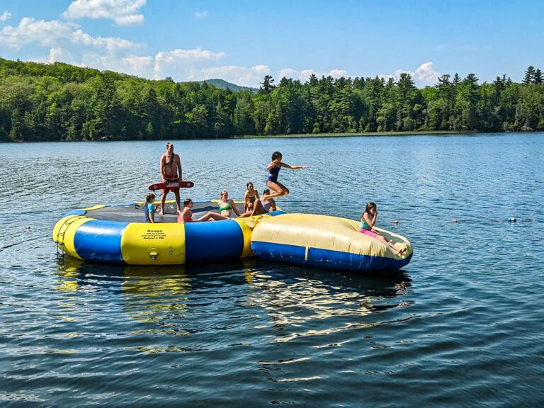 Campers on water trampoline