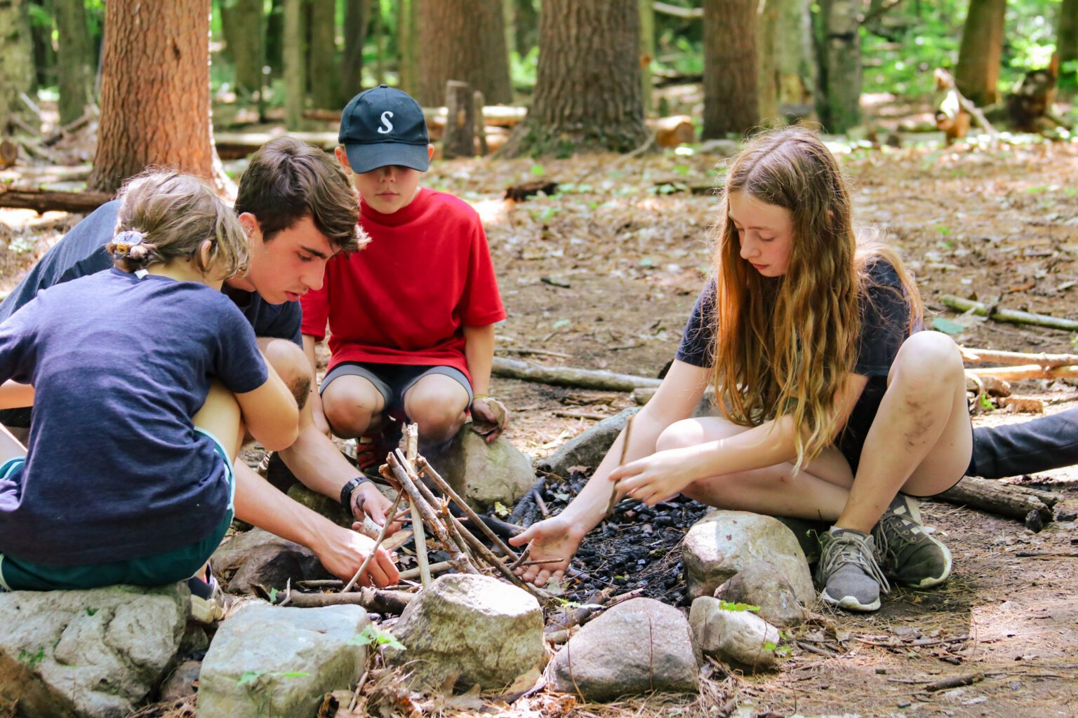 Campers building a fire