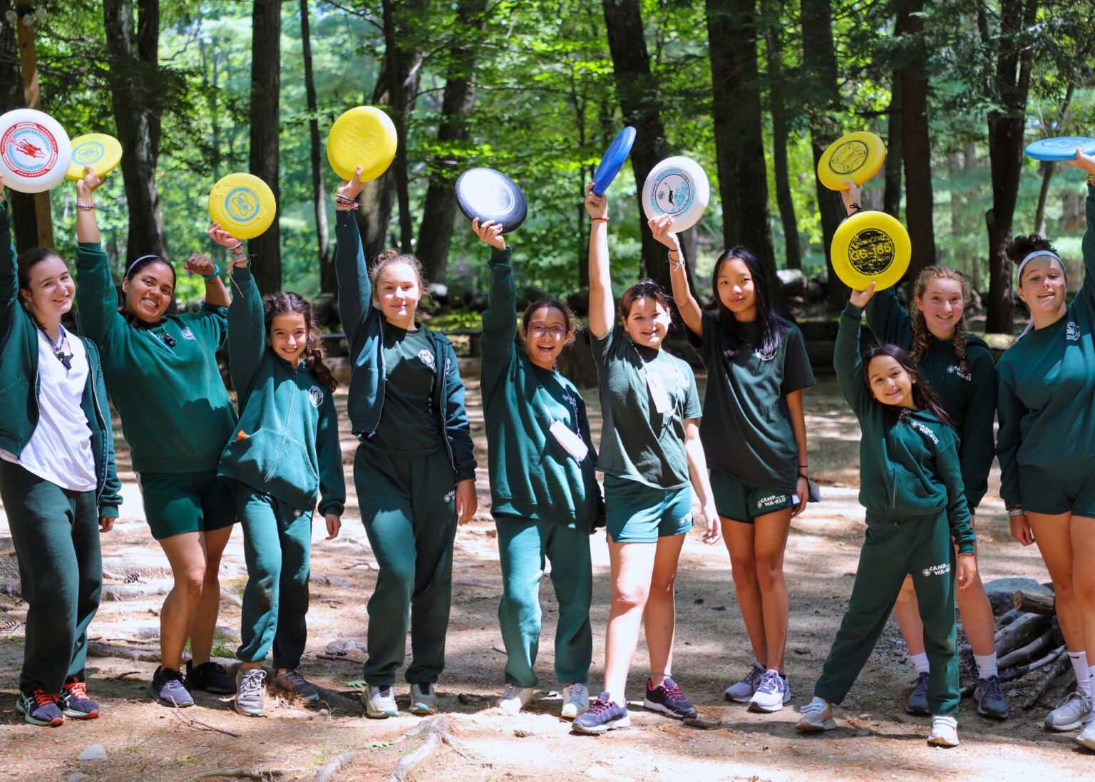 Group holding frisbees