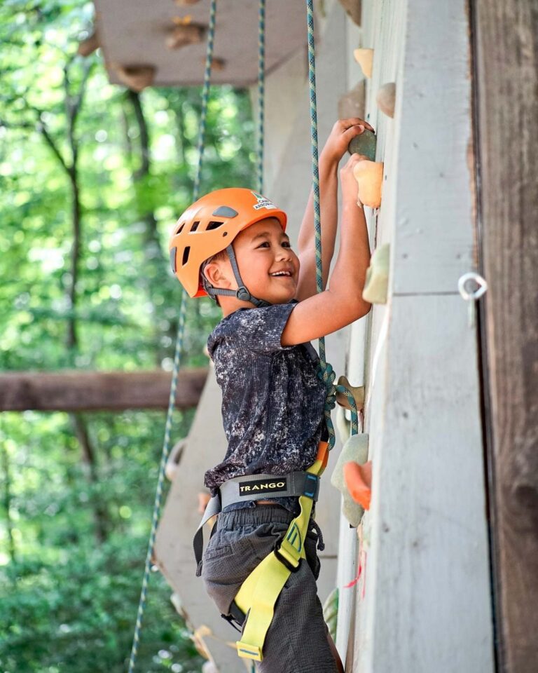 Boy on climbing wall