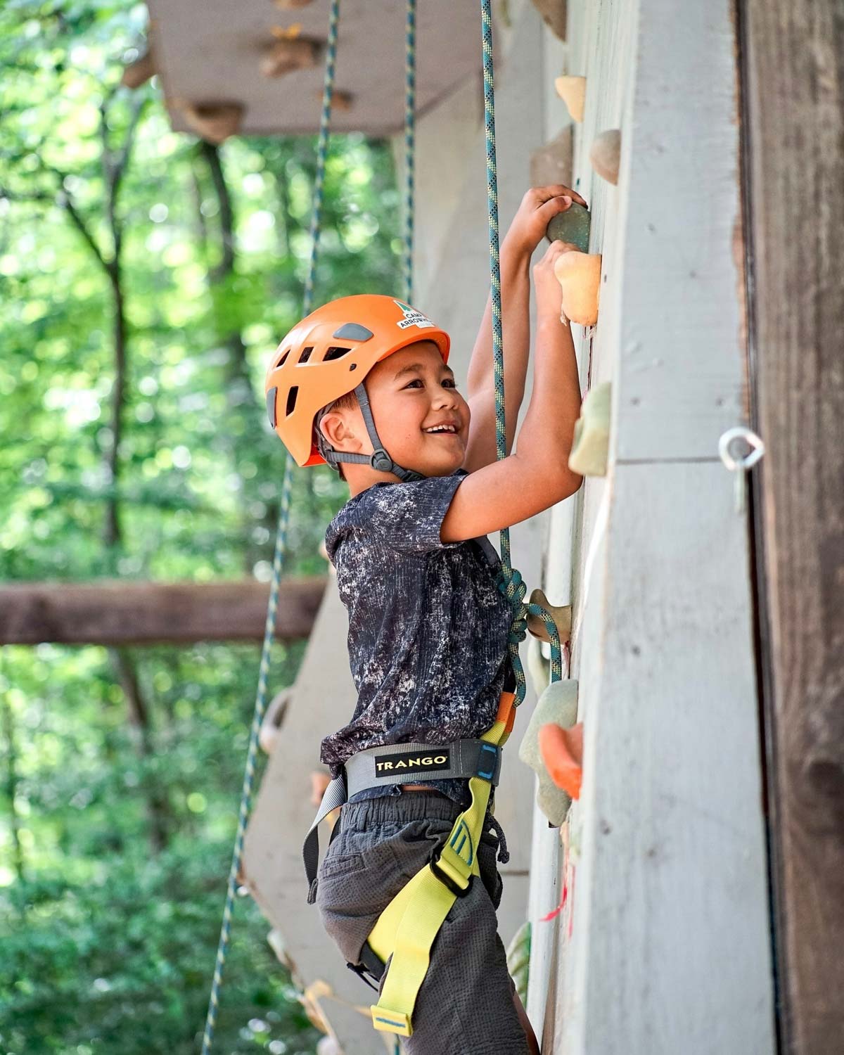 Boy on climbing wall