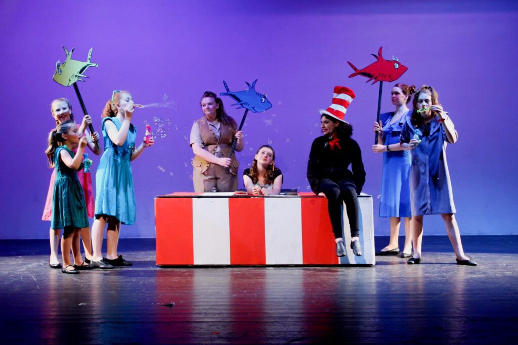 Theatre campers performing on stage