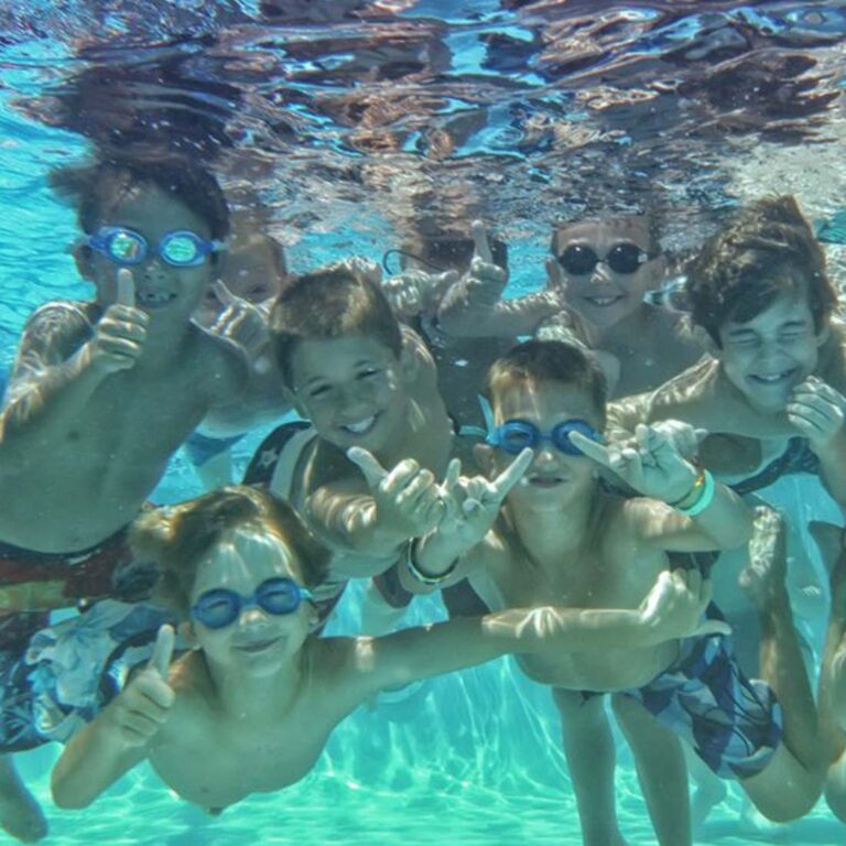 Happy boys underwater