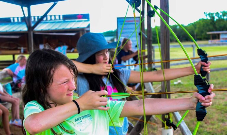Girls at archery range