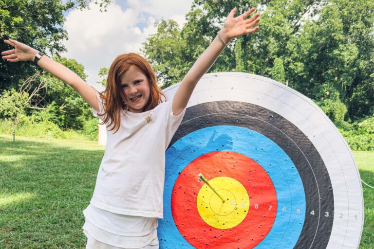 Girl near archery target