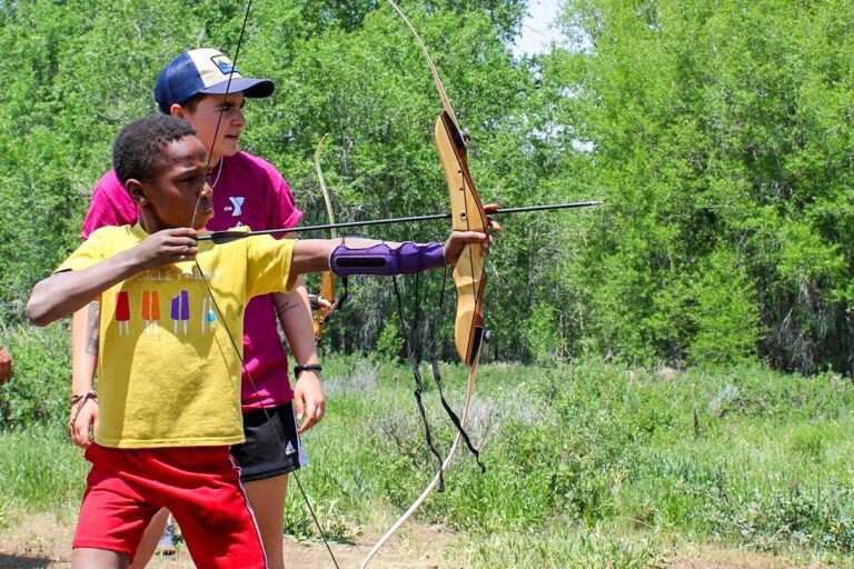 Boy shooting arrow