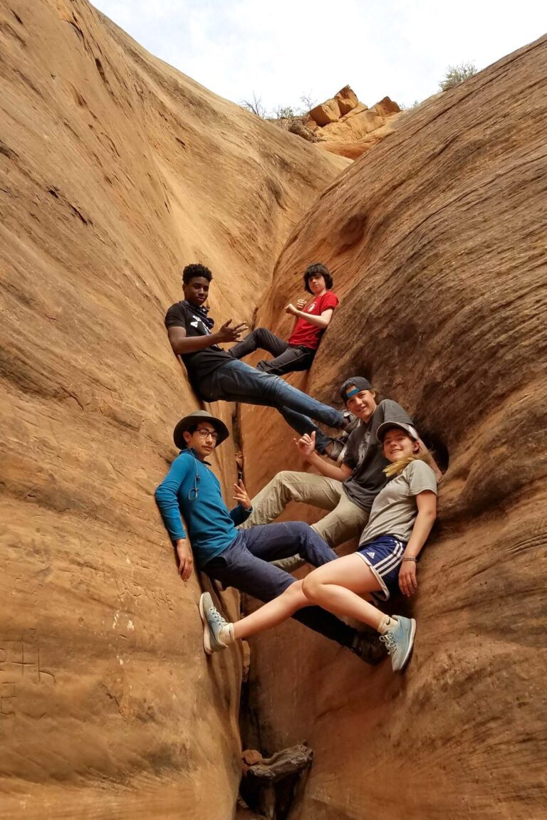 Teens on red rocks