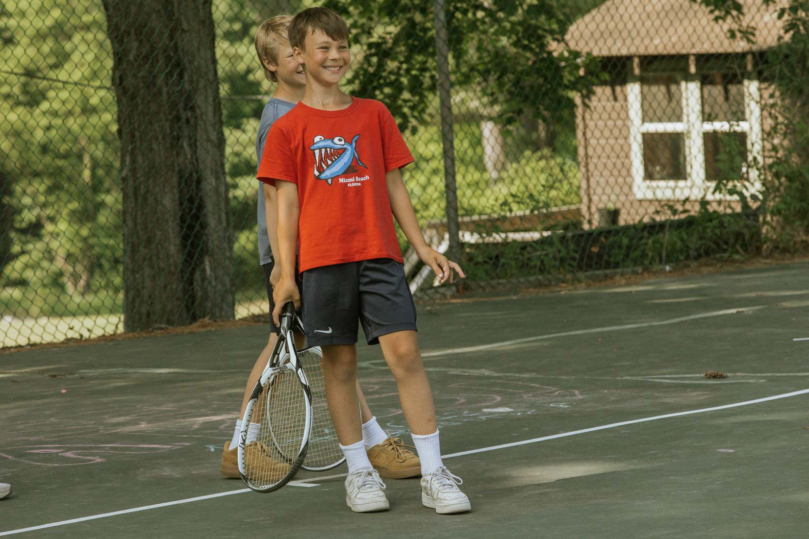 Boy playing tennis