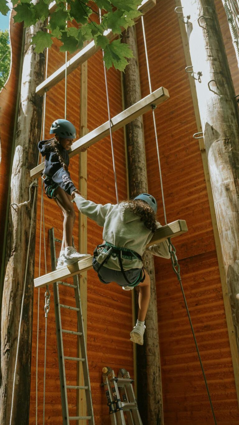 Campers on climbing course