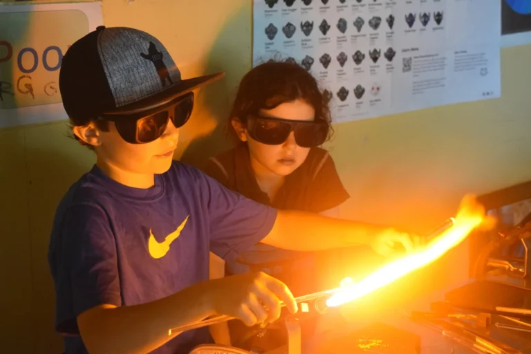 Boys glass blowing