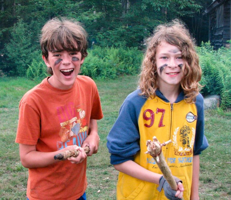 Two boys with spears