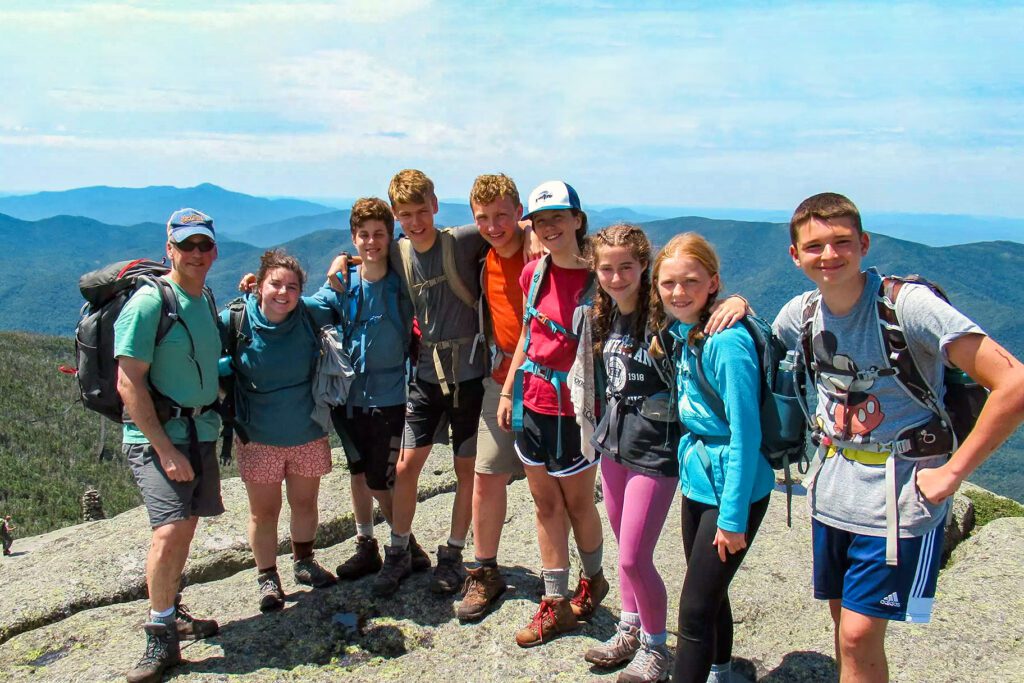 Group of campers on mountain summit