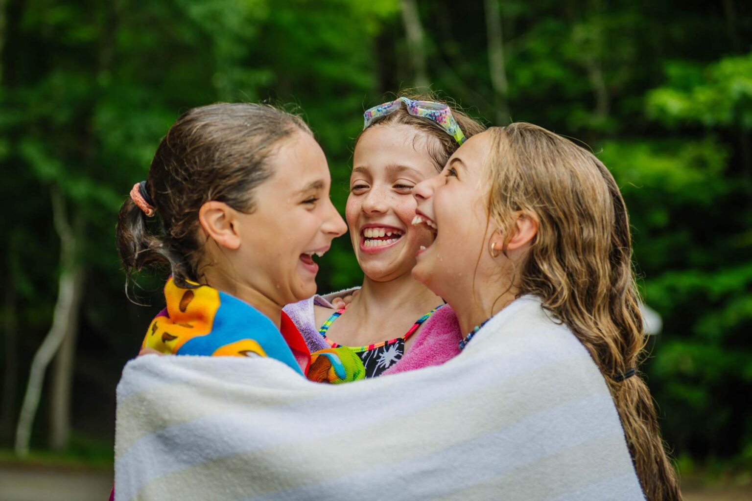 Cheerful girls hugging