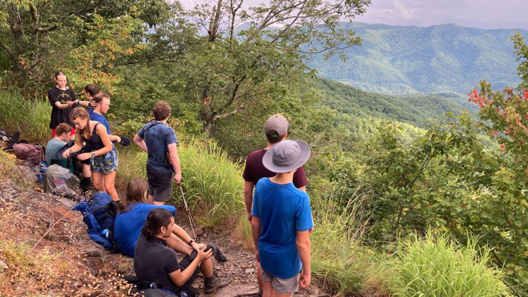 Teen hikers near scenic lookout