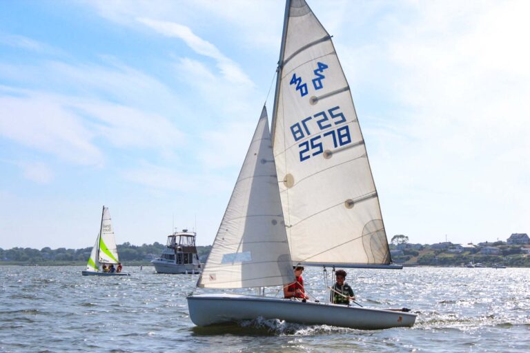Campers in a sailboat