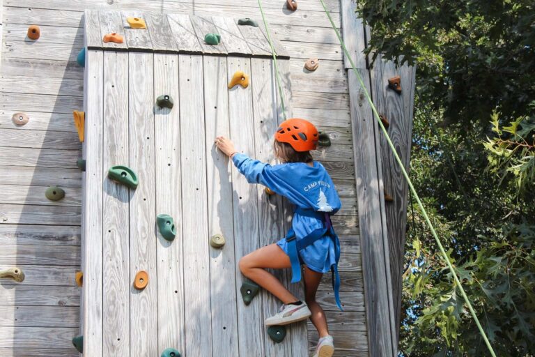 Girl on climbing wall