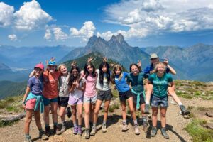 Teen girls on mountain summit