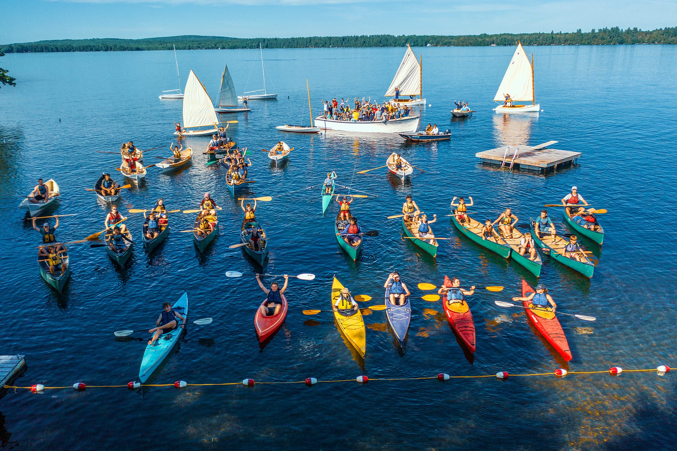 Boys in a fleet of boats