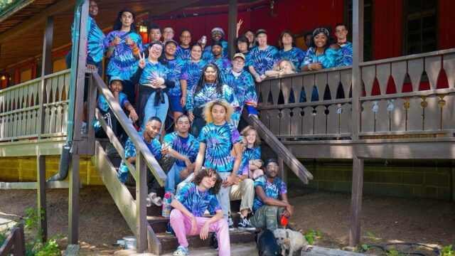 Group wearing tie-dye shirts