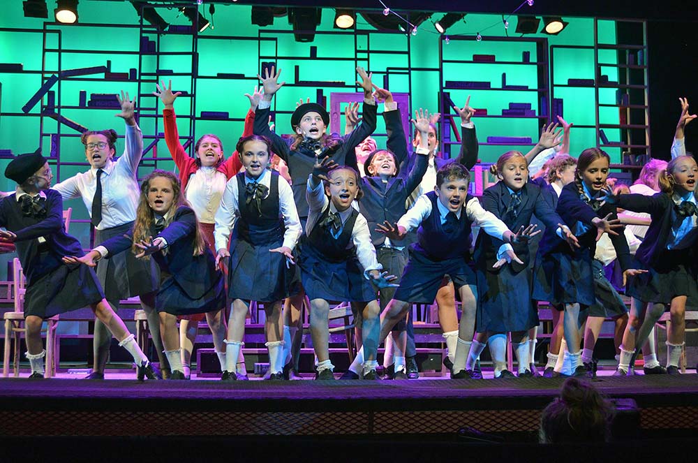 Campers performing on stage