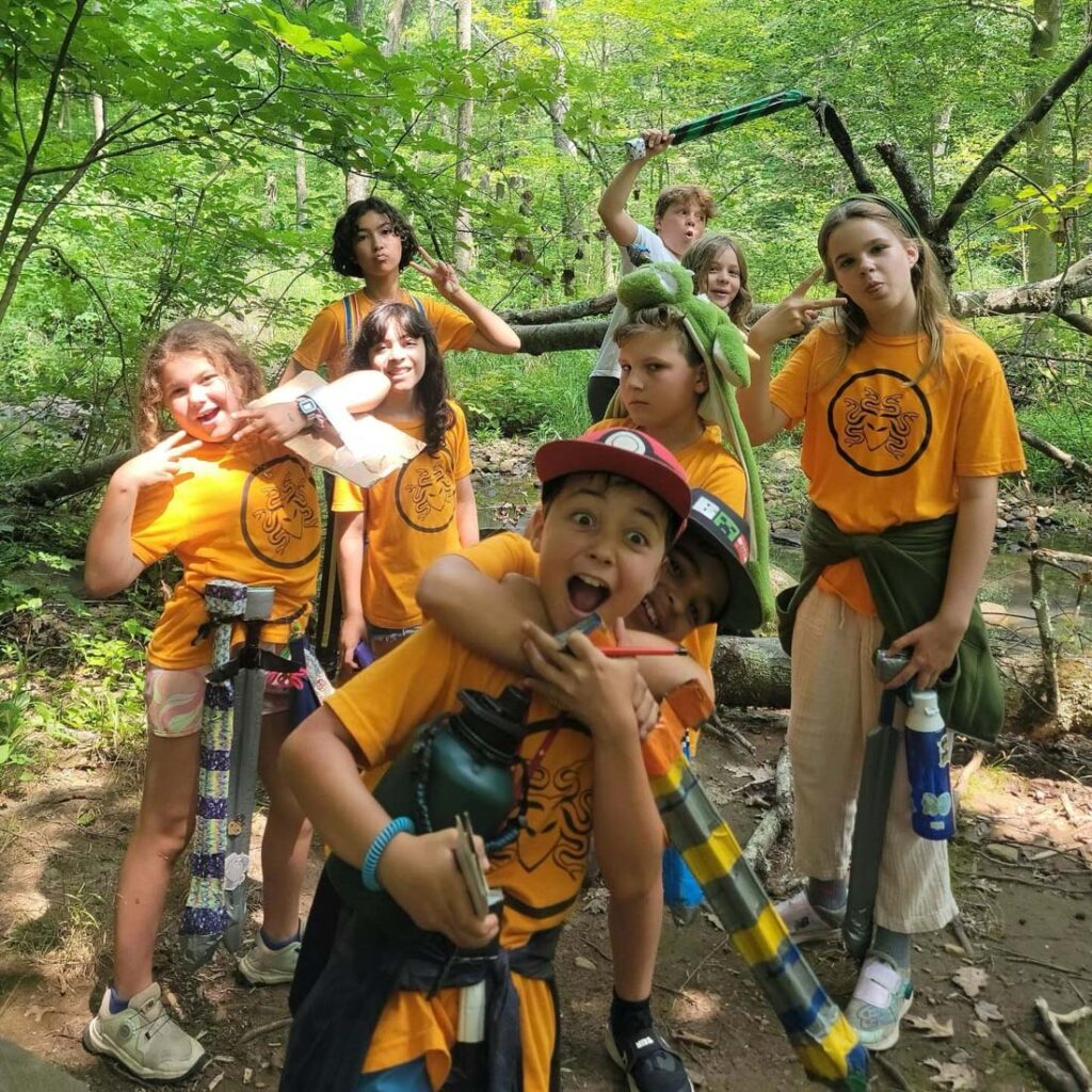 Campers LARPing in forest