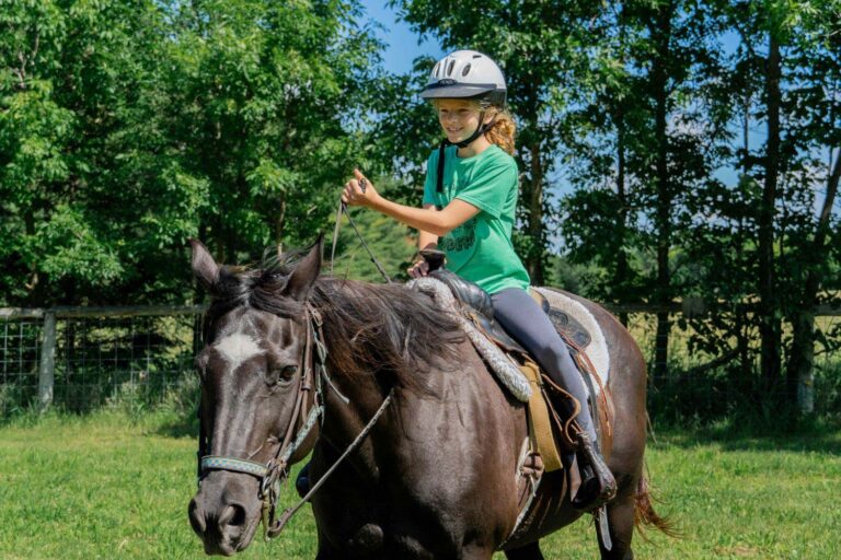 Girl riding a horse