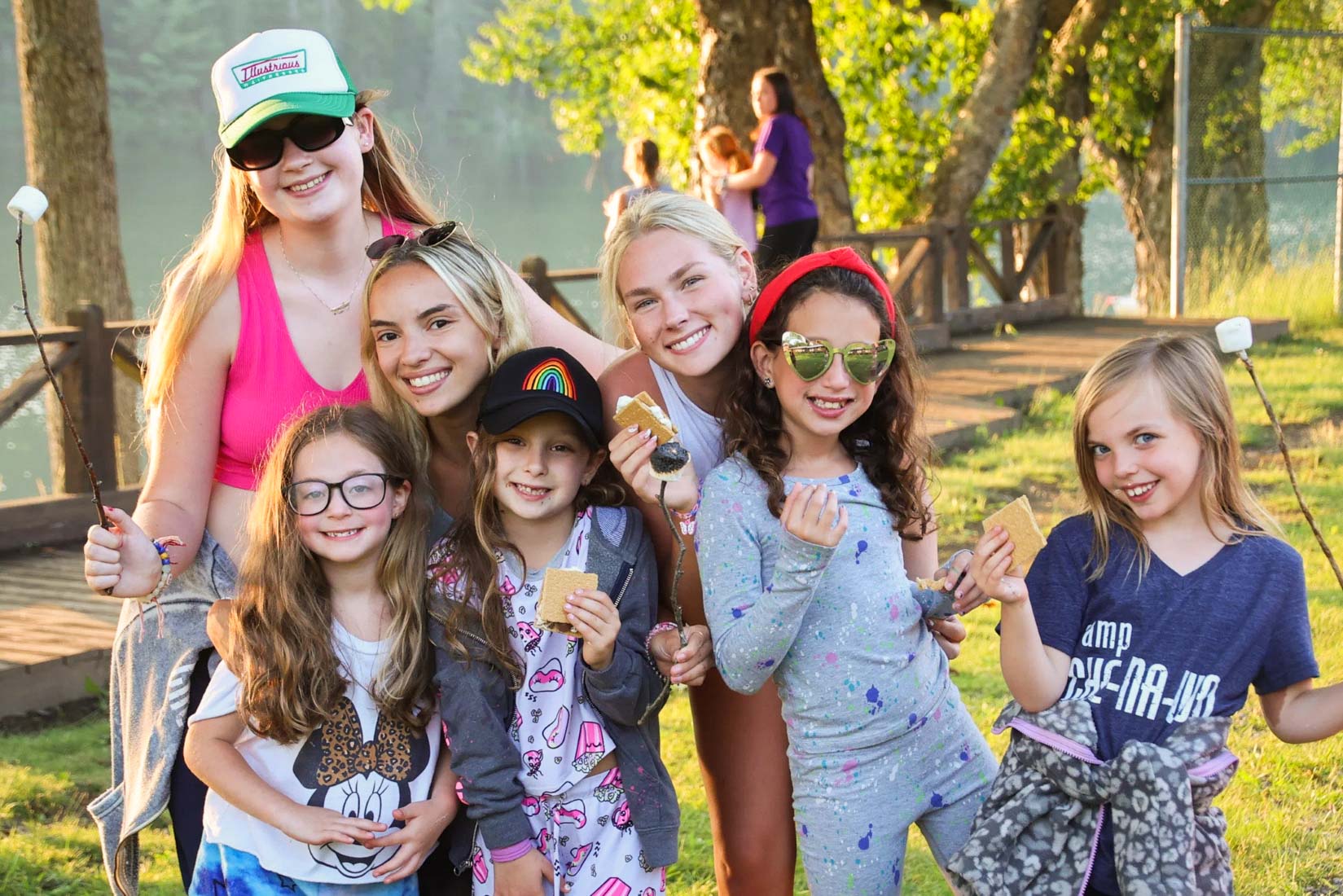 Happy girls eating s'mores