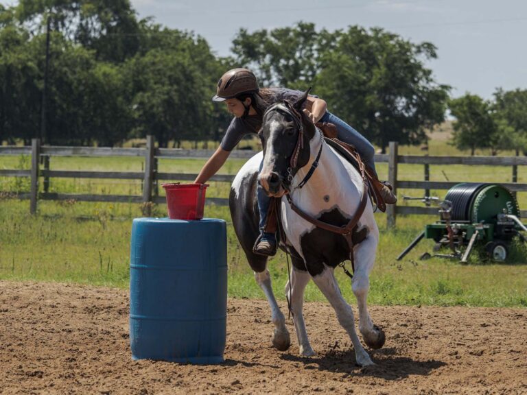 Girl horseback riding