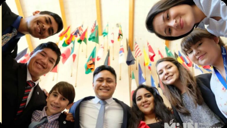 Group of smiling debate campers